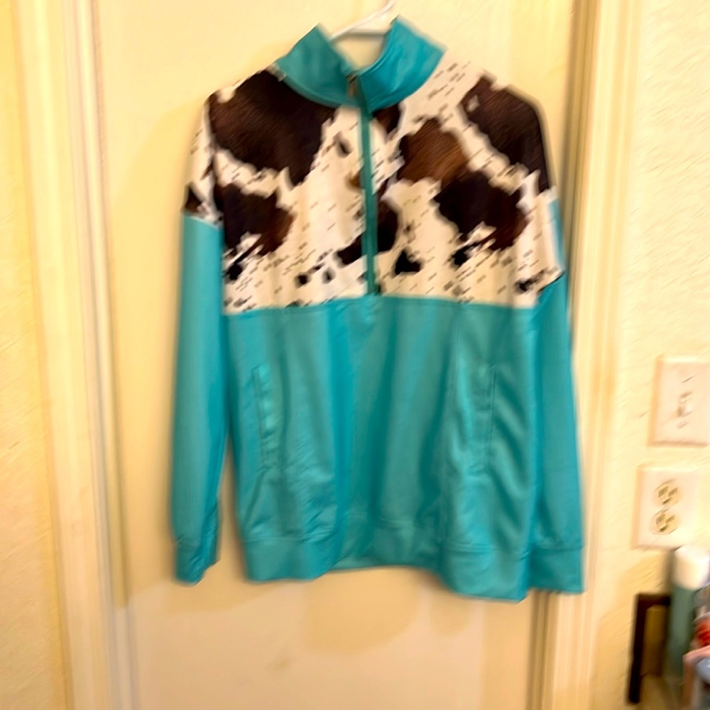 Turquoise and cowhide pullover.  Super cute